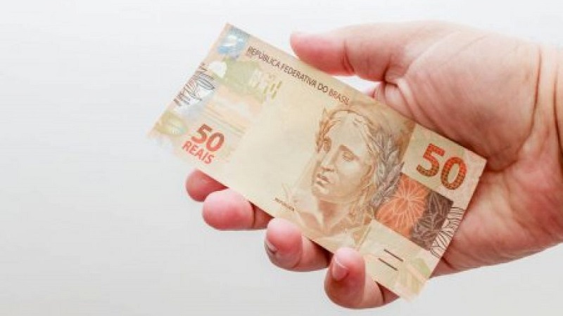 Nota de 50 reais: usando dinheiro em Salvador